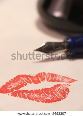 lip imprint with pen and ink bottle