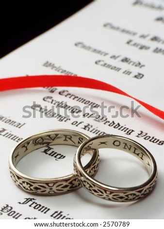 rings on a wedding program