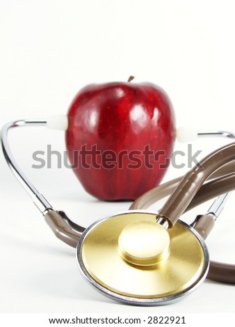 eat more fruit - a red apple with stethoscope