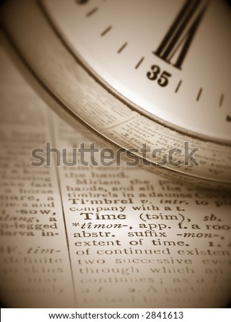 sepia toned clock face with the definition of time
