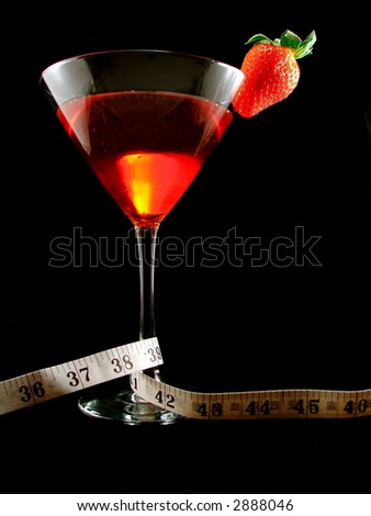 strawberry martini with tape measure wound around stem