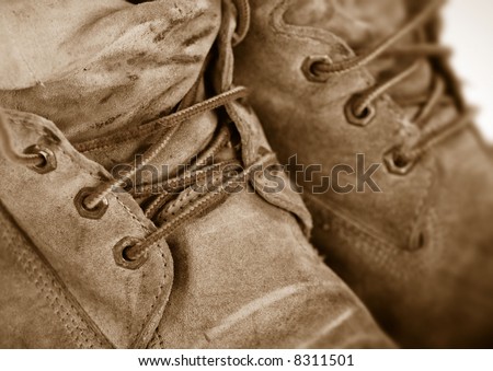 close-up of work boots in sepia