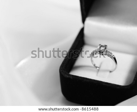 stock photo Black white engagement ring in a velvet box
