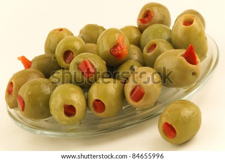 Green olives stuffed with red peppers