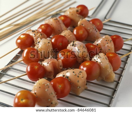 Placing the brochettes on the oven rack