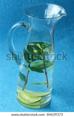 Jug of water with mint and lime