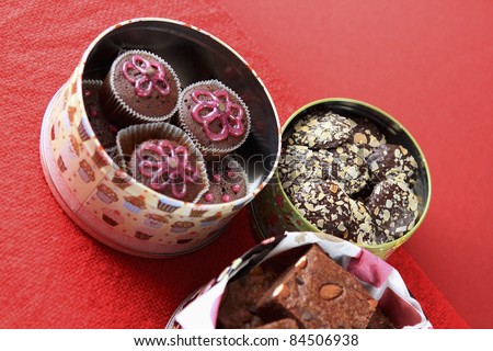 Assorted cakes in tin boxes