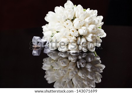 White wedding bouquet on a black background