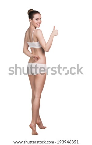 Portrait of a happy young woman with perfect fit body.