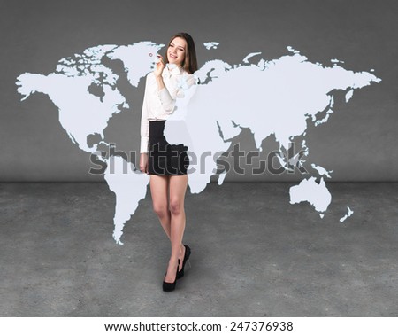 Business woman draw a point on a virtual map, a global business