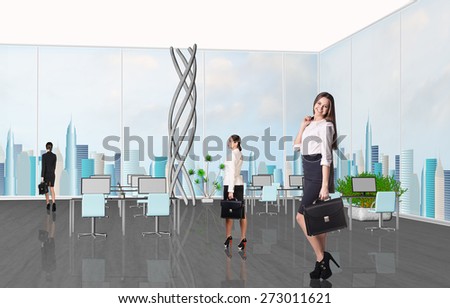 Young people in the modern office with large windows