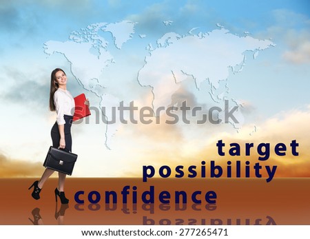 Image of confident businesswoman with briefcase walking up to target. Map from NASA