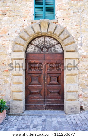 Italy. Romagna Apennines, San-Leo village ancient building entrance.