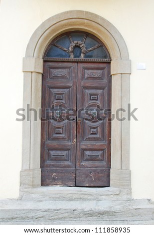 Italy. Romagna Apennines, San-Leo village antique building door