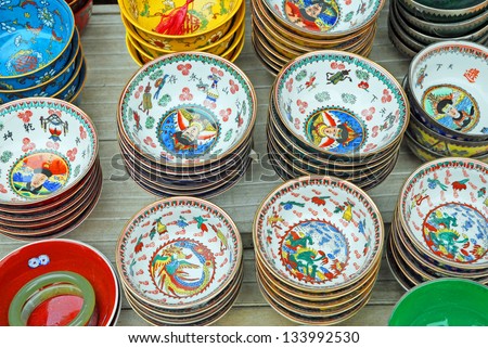 SHANGHAI, CHINA-MAY 4: Dongtai Lu Antique Market colorful Chinese cups on sale. The market is great for mementos and souvenirs of Shanghai. May 4, 2007 Shanghai, China