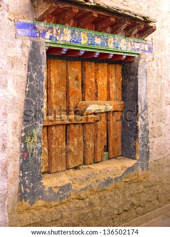 LHASA, TIBET-NOVEMBER 13: popular house door in Barkhor Street. The ancient street is a symbol of Lhasa and a must see place for visitors. November 13, 2004 in Lhasa, Tibet