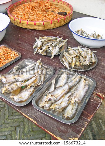 JINXI, SHANGHAI, CHINA Ã¢Â?Â? FEBRUARY 6: dry fishes and shrimps in a village street shop. The ancient village is a Shanghai tourist attraction with 100000 visitors year. February 6, 2005, Jinxi, China