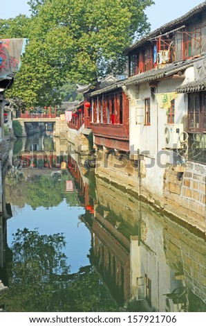 JINXI, SHANGHAI, CHINA  JANUARY 9: typical village waterway. The ancient village is a Shanghai tourist attraction with 100000 visitors per year. January 9, 2010, Jinxi, China