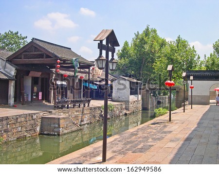 NANXUN, SHANGHAI, CHINA Ã¢Â?Â? AUGUST 28:. village main canal view. The Nanxun water village is Shanghai tourist attraction with 100000 visitors year. August 28, 2004,Nanxun, China