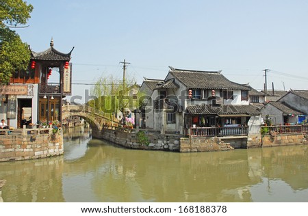 FENGJING, SHANGHAI, CHINA - MARCH 17: famous village spot named three bridges. The ancient village is a Shanghai tourist attraction with 100,000 visitors per year. March 17, 2010, Fengjing, China.