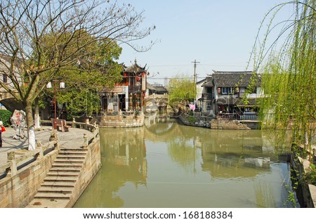 FENGJING, SHANGHAI, CHINA - MARCH 17: famous village spot named three bridges. The ancient village is a Shanghai tourist attraction with 100,000 visitors per year. March 17, 2010, Fengjing, China.