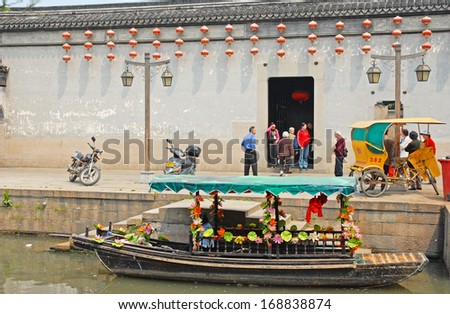 NANXUN, SHANGHAI, CHINA -Â?Â? APRIL 11: wedding along the main canal. The Nanxun water village is Shanghai tourist attraction with 100000 visitors year. April 11, 2007,Nanxun, China