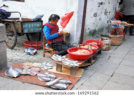 ZHOUZHUANG, SHANGHAI-NOVEMBER 12: old village street shop. Zhouzhuang water village is Shanghai tourist attraction with 1000000 visitors year November 12, 2007 Zhouzhuang,