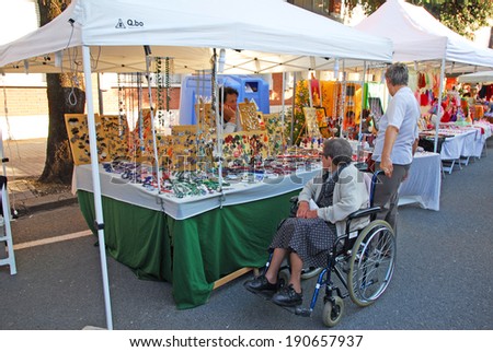 RUSSI, RAVENNA, ITALY- SEPTEMBER 16, 2012: earring and necklaces vendor at the Seven Sorrows annual fair. The exhibition is very popular in the city and attracts thousands of people.