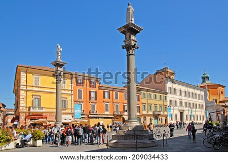RAVENNA, ITALY- APRIL 17, 2014: tourists and locals in People square. The city defined by UNESCO heritage of humanity has 3 million tourists per year