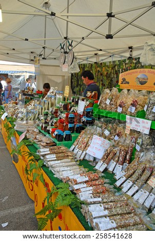 CERVIA, ITALY-SEPTEMBER 21, 2014: sauce and pasta stand at the annual International food outdoor market. This market is very popular and attract thousands of tourists.