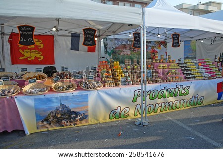 CERVIA, ITALY-SEPTEMBER 21, 2014: Normandie food  stand at the annual International food outdoor market. This market is very popular and attract thousands of tourists.