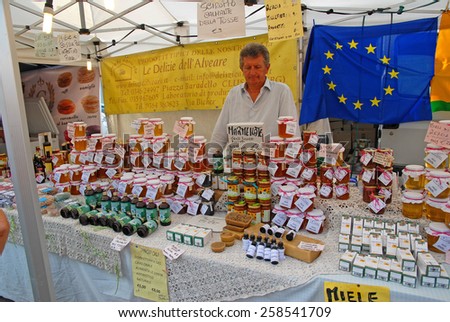 CERVIA, ITALY-SEPTEMBER 21, 2014: delights of the beehive stand at the annual International food outdoor market. This market is very popular and attract thousands of tourists.