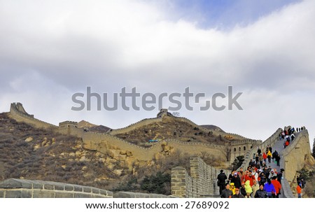 BADALING, CHINA - NOV 18: Tourists walk on the Great Wall of China November, 18 2008 in Badaling. 10 million people trek the Great Wall every year making it China\'s most popular tourist destination.