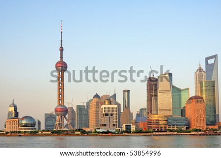 China Shanghai the pearl tower and Pudong skyline at sunset.
