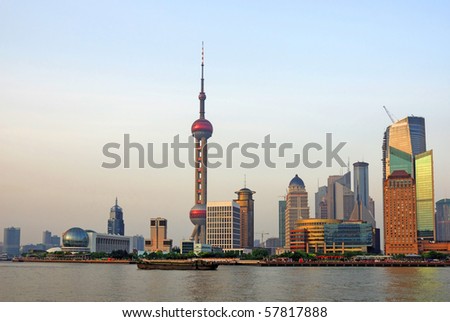 China Shanghai the pearl tower and Pudong skyline at sunset.