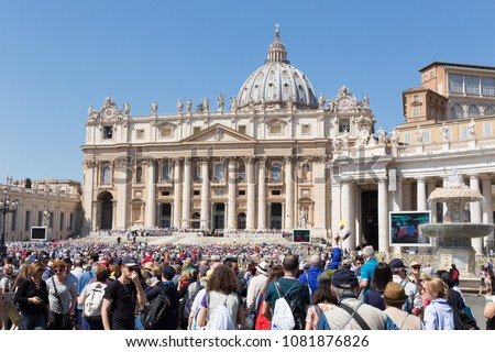Front view of St. Peters basilica from St. Peter\'s square in Vatican City, Vatican.