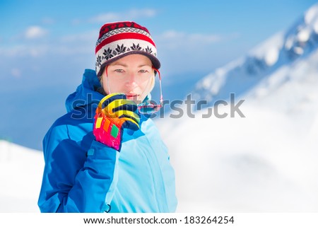 Portrait of active woman outdoors skiing in the Alps Mountains, Triglav natural park, Vogel, Slovenia.