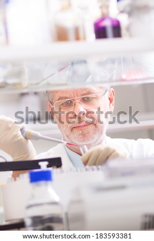 Life scientist researching in laboratory. Life sciences comprise fields of science that involve the scientific study of living organisms: microorganism, plant, animal and human cells, genes, DNA...