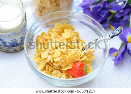 corn flakes, milk, strawberry and iris