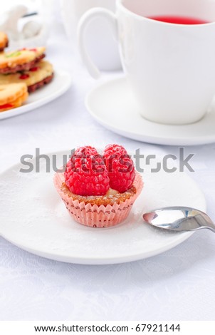 delicious fresh berry cake with tea