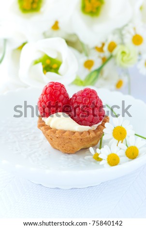 delicious fresh raspberry cake and spring flowers