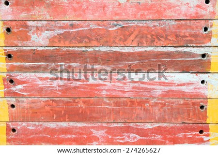 red wood plank with yellow stripe background