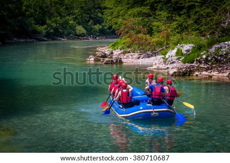Rafting at Tara mountain river. Group of tourists in the inflatable raft Montenegro