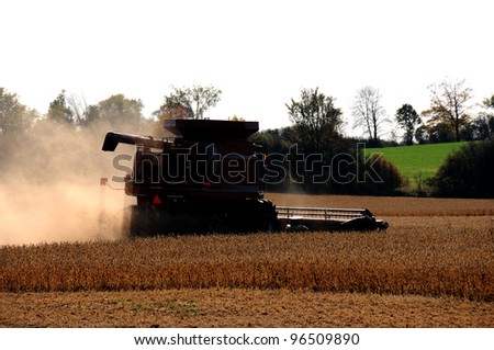 Combine Harvester harvesting crop