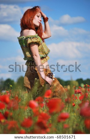 Girl in poppy field