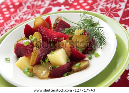 Salad of beets, potatoes and pickled cucumbers and dill