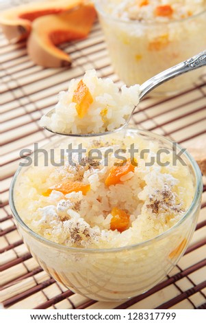 Rice pudding with pumpkin, sugar and cinnamon