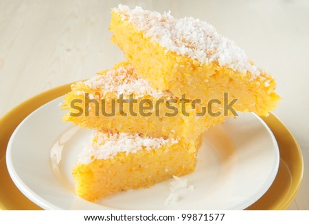 Semolina pudding with pumpkin and coconut on plate