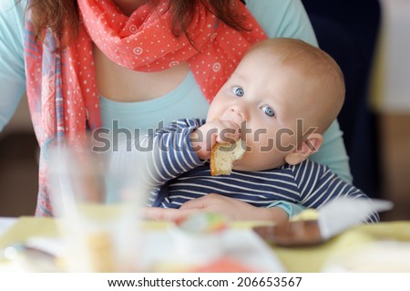 Little baby boy having piece of bread Little baby boy having piece of bread