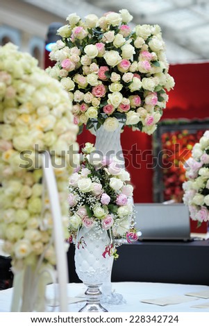 Balls of natural roses as wedding or party decoration